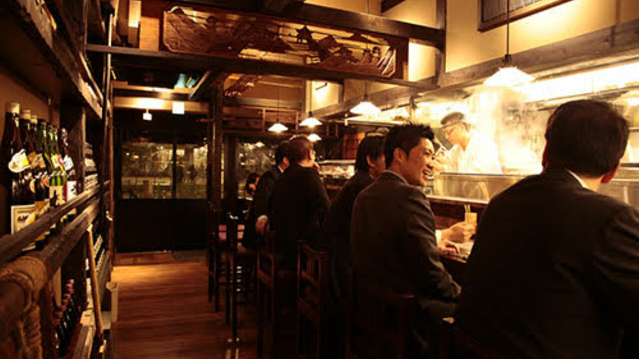 鶏鬨で働く人の写真1枚目