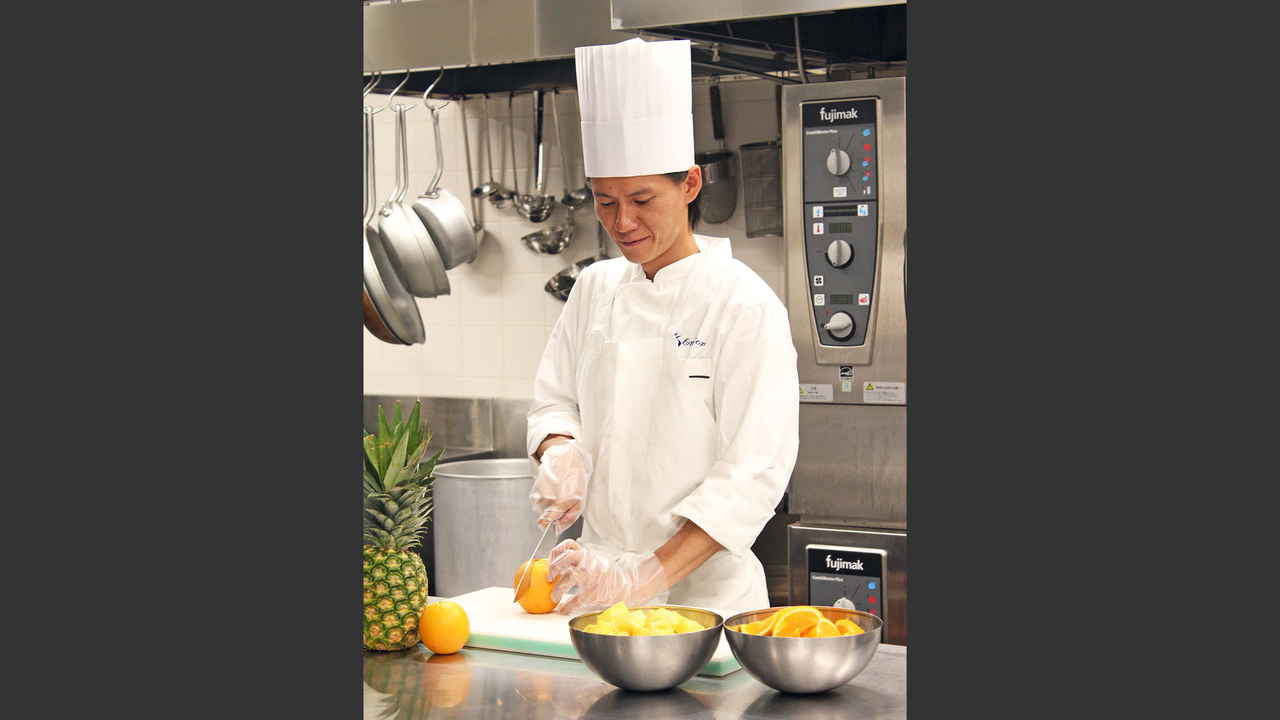 ホテル コメントで働く人の写真2枚目