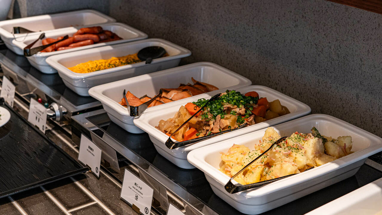 高ようじで働く人の写真1枚目