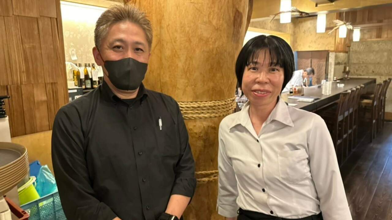 然で働く人の写真1枚目