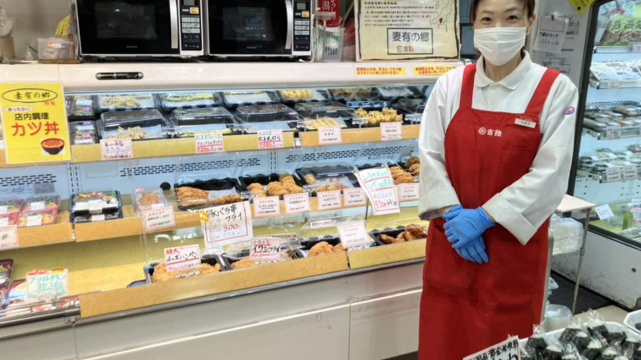 吉池で働く人の写真1枚目