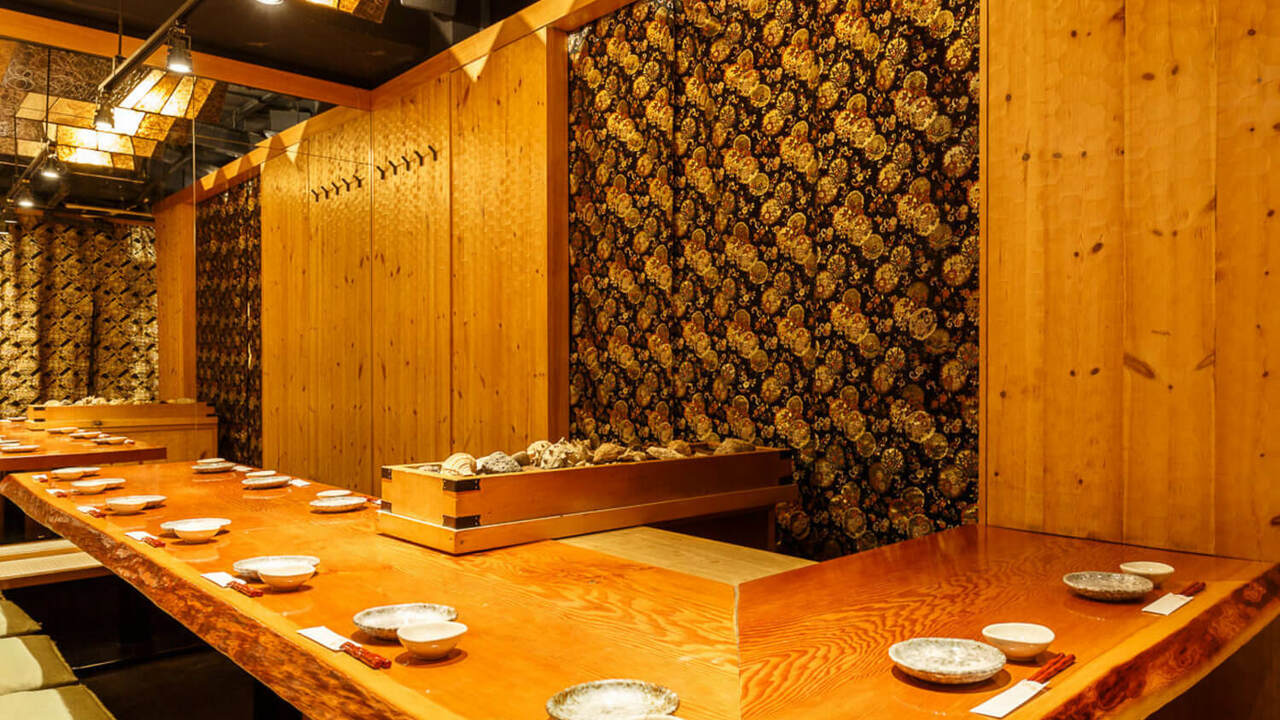 金の独楽で働く人の写真1枚目