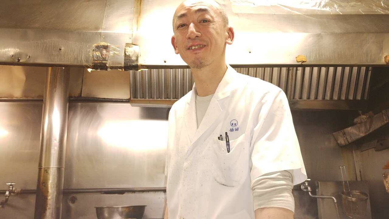 萬里で働く人の写真1枚目