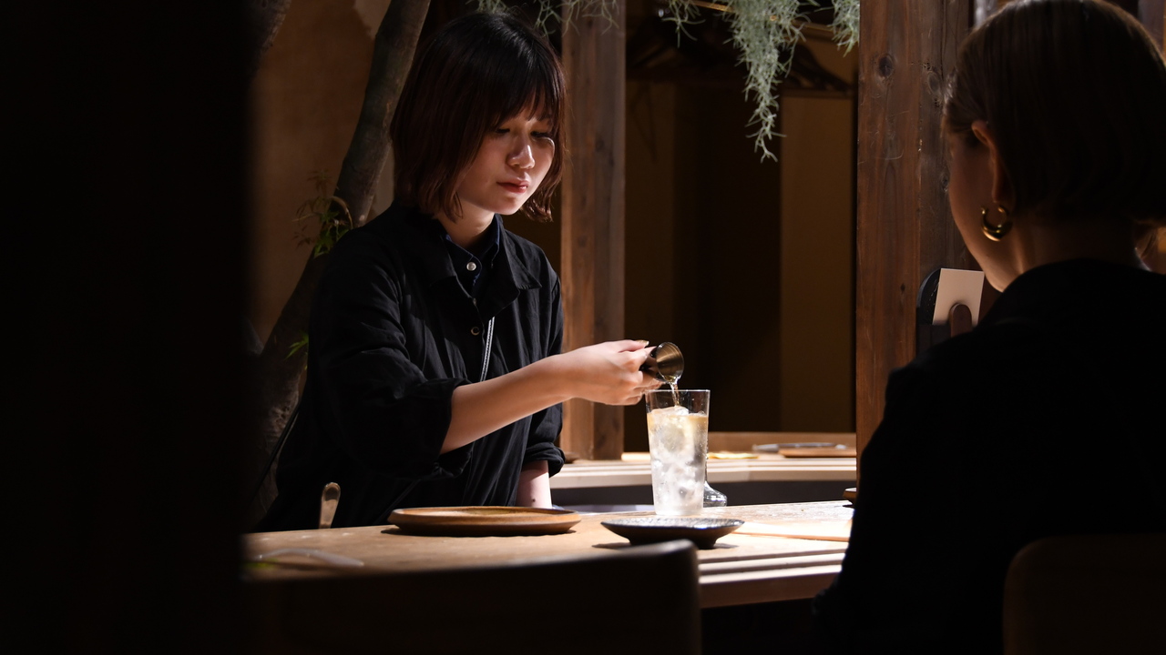 μで働く人の写真1枚目