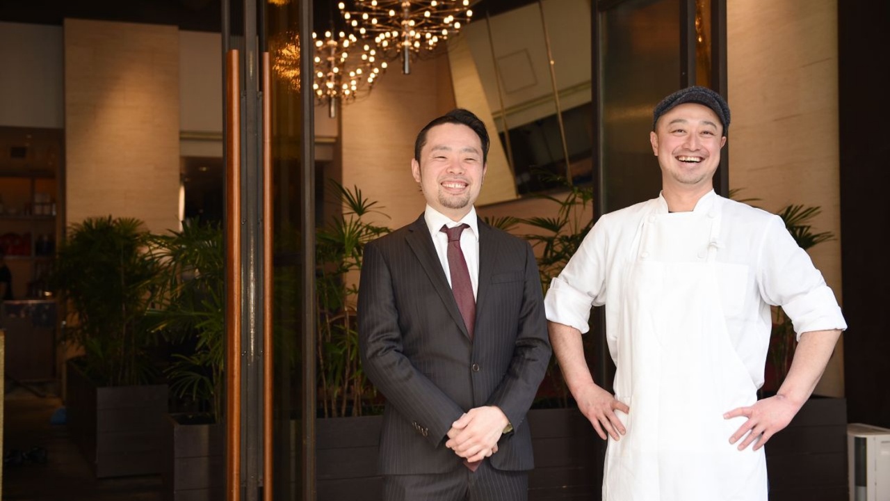 四五六で働く人の写真2枚目