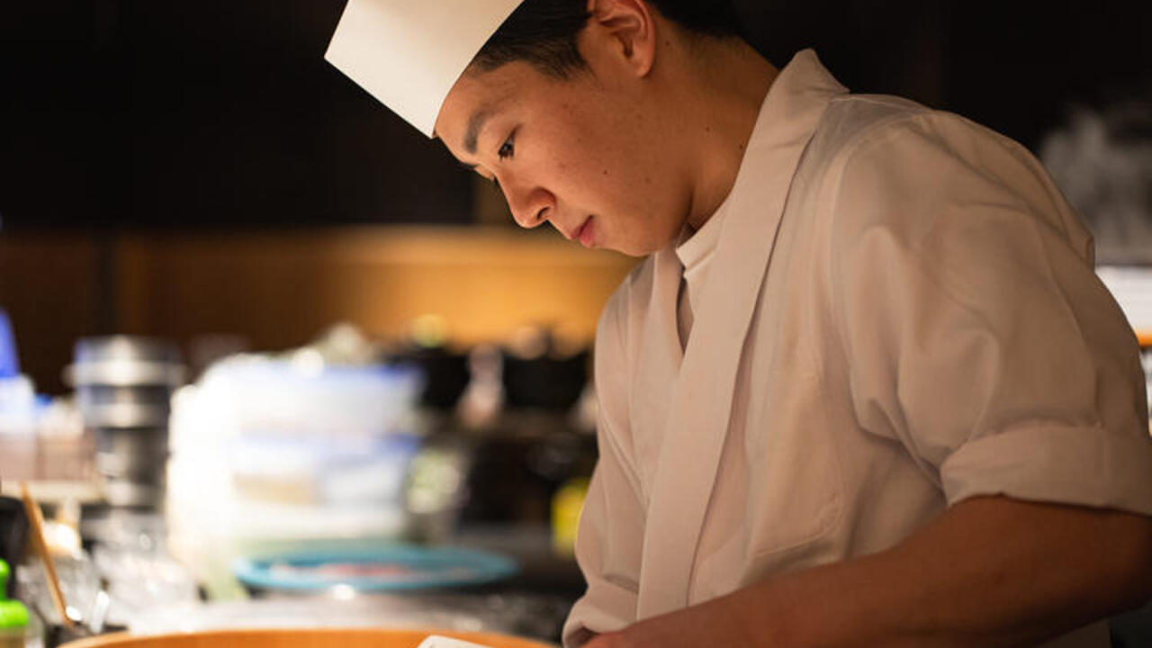 ちょうつがひで働く人の写真2枚目