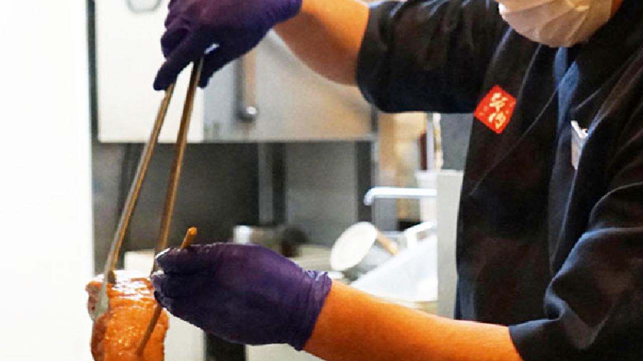 喜多方ラーメン坂内で働く人の写真2枚目