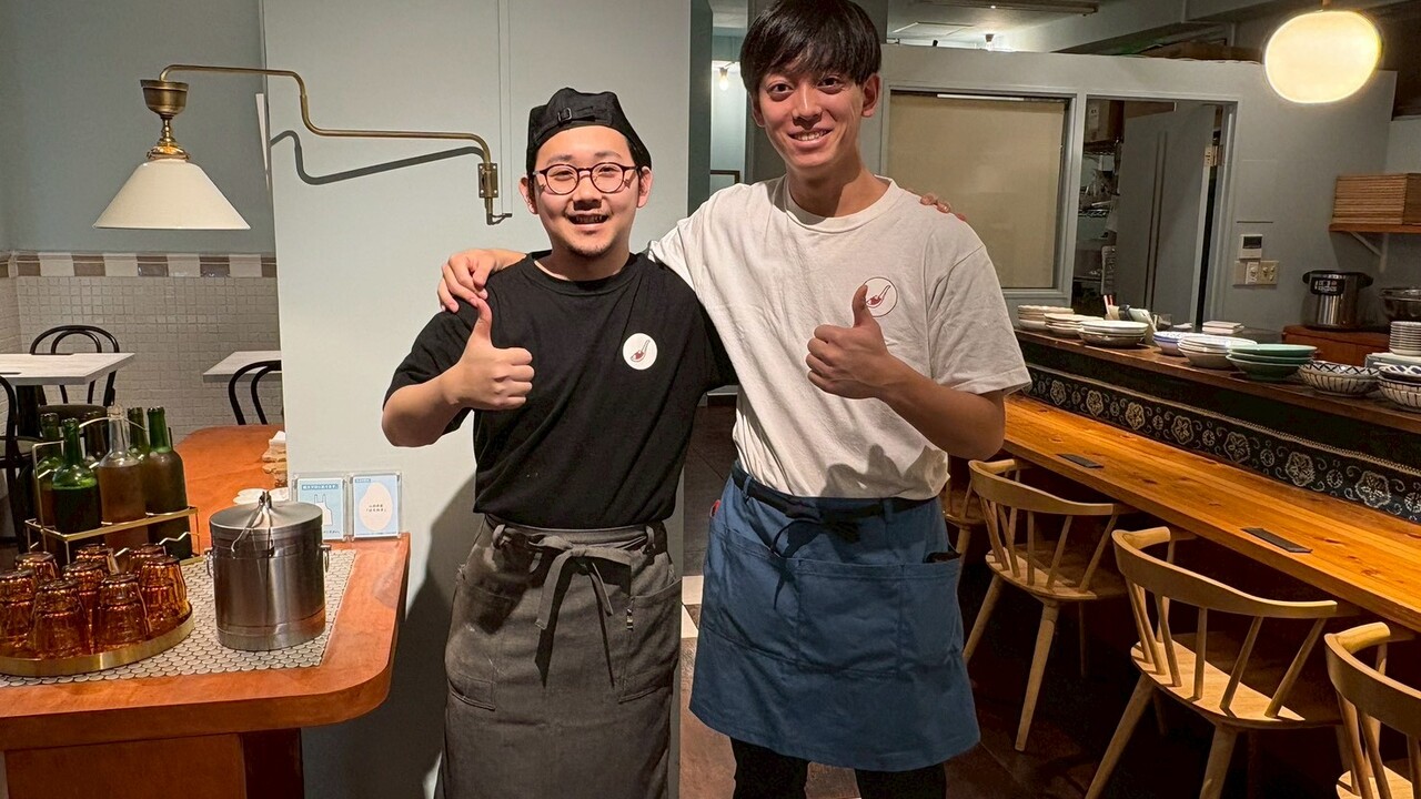 麻婆飯店で働く人の写真1枚目