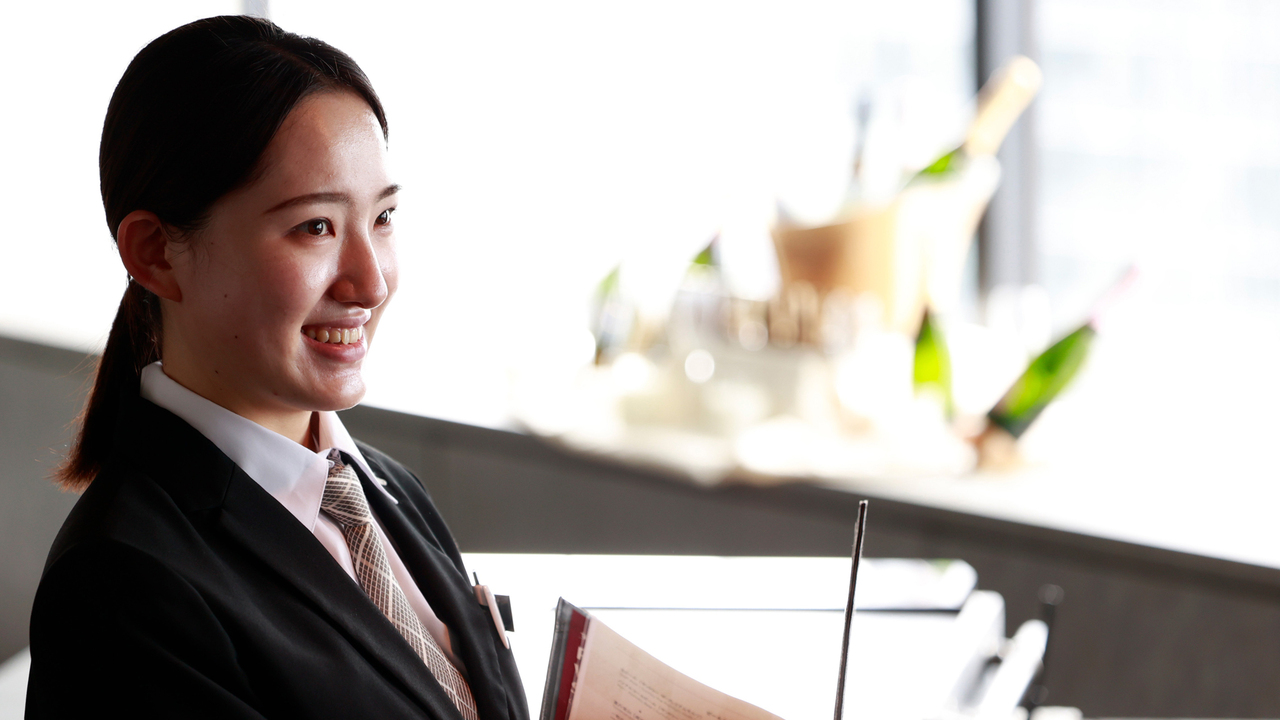 レクトーレで働く人の写真1枚目