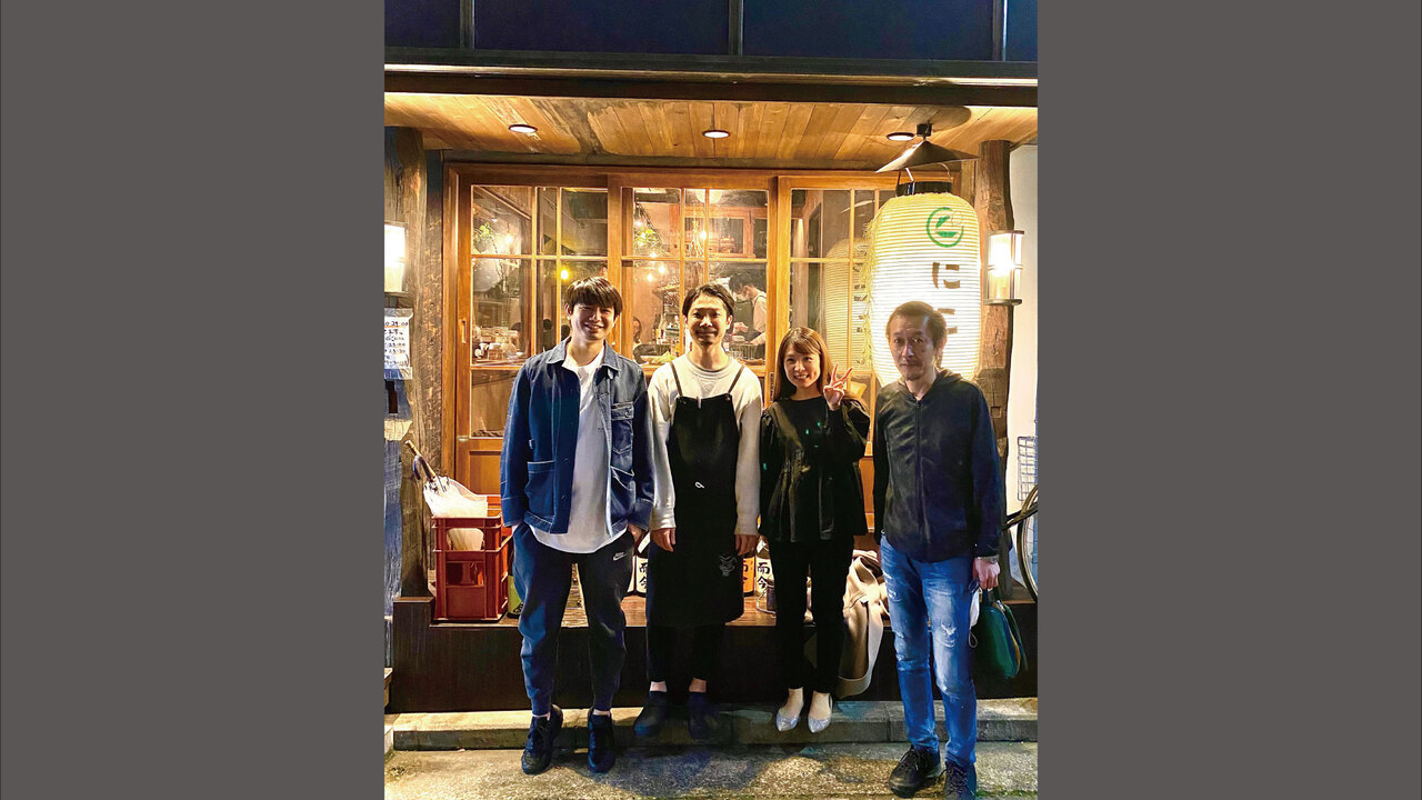 にこんで働く人の写真3枚目